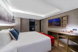 Foto sihtkohas Guangzhou asuva majutusasutuse LIZ International Hotel Guangzhou Olympic Sports Center International Financial City Branch - Free Shuttle Bus to Canton Fair Complex During Canton Fair Period & Free Breakfast & Free Afternoon Tea & Free Midnight Snack galeriist