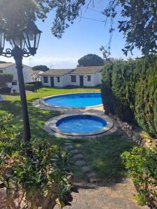 Bazén v ubytování Casa Llorell, Piscina , Barbacoa Terraza, Tossa de Mar nebo v jeho okolí