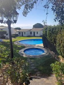 Bazén v ubytování Casa Llorell, Piscina , Barbacoa Terraza, Tossa de Mar nebo v jeho okolí + 19 fotografií