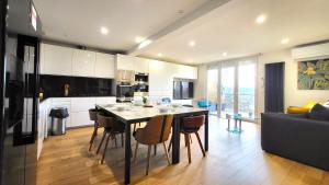 Dapur atau dapur kecil di Le Bellevue - Beaux appartements avec vue splendide