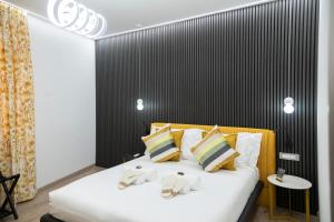 Postel nebo postele na pokoji v ubytování Teulada Luxury Rooms