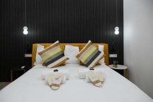 Postel nebo postele na pokoji v ubytování Teulada Luxury Rooms