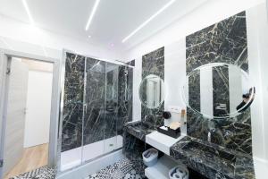 Koupelna v ubytování Teulada Luxury Rooms