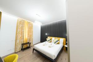Postel nebo postele na pokoji v ubytování Teulada Luxury Rooms
