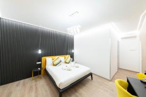Postel nebo postele na pokoji v ubytování Teulada Luxury Rooms