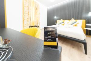 Postel nebo postele na pokoji v ubytování Teulada Luxury Rooms