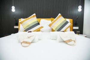 Postel nebo postele na pokoji v ubytování Teulada Luxury Rooms