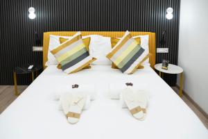 Postel nebo postele na pokoji v ubytování Teulada Luxury Rooms