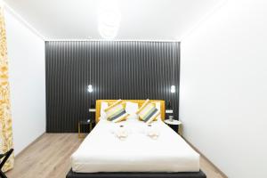 Postel nebo postele na pokoji v ubytování Teulada Luxury Rooms