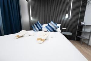 Postel nebo postele na pokoji v ubytování Teulada Luxury Rooms