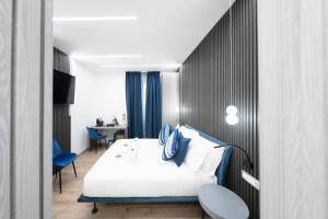 Postel nebo postele na pokoji v ubytování Teulada Luxury Rooms
