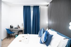 Postel nebo postele na pokoji v ubytování Teulada Luxury Rooms