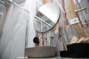 Koupelna v ubytování Teulada Luxury Rooms