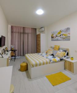 Postel nebo postele na pokoji v ubytování Sky Apartments