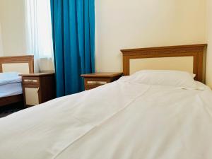 Voodi või voodid majutusasutuse SD Hotel toas