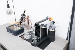 Příslušenství pro přípravu čaje a kávy v ubytování Teulada Luxury Rooms + 37 fotografií