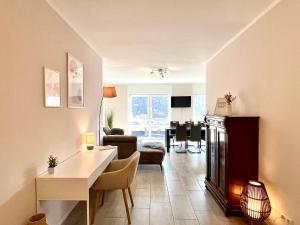 Гостиная зона в Ferienwohnung Moseltraum, 1-6 Pers, mit 3 Schlafzimmer und Panoramabalkon