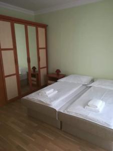 Posteľ alebo postele v izbe v ubytovaní Apartmány ORAVA-EDDA