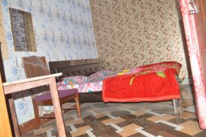 Voodi või voodid majutusasutuse Ayodhya Dham Guest House toas