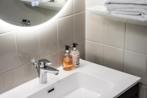 Koupelna v ubytování Sundvolden Hotel