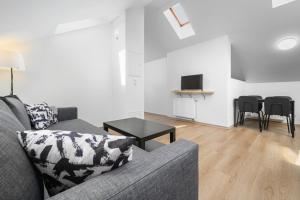 TV a/nebo společenská místnost v ubytování Wellness Rooms Central