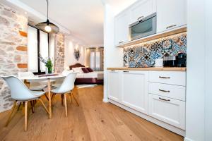 Η κουζίνα ή μικρή κουζίνα στο Apartmani De Amicis