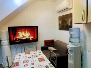 Et tv og/eller underholdning på Encantadora Boutique Home Villa