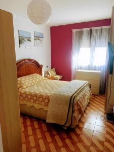 En eller flere senge i et værelse på Encantadora Boutique Home Villa