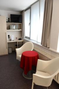 Kuchyň nebo kuchyňský kout v ubytování Hotel Vijfwegen
