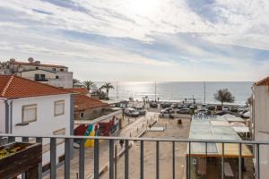 a view of the ocean from a balcony at Casa da Praça Guest House in Sesimbra +54 photos