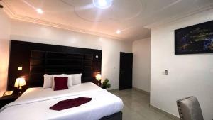 Katil atau katil-katil dalam bilik di hotel Guidotti