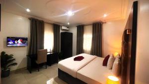 Katil atau katil-katil dalam bilik di hotel Guidotti