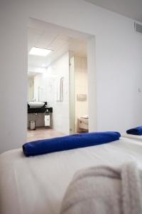 A bed or beds in a room at Playitas Villas - Sports Resort