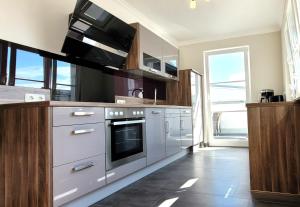 Kuchyň nebo kuchyňský kout v ubytování Warnemünde Strandnest 24350