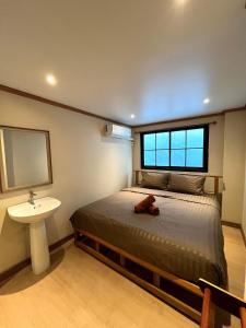 Tian Ming Hostel客房内的一张或多张床位