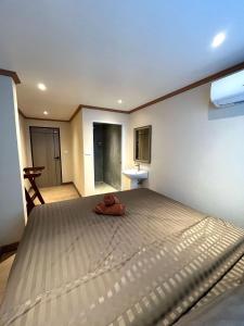 Tian Ming Hostel客房内的一张或多张床位