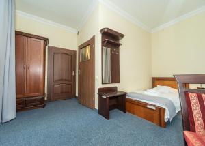 Postel nebo postele na pokoji v ubytování Hotel Marczewski
