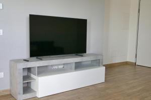 TV a/nebo společenská místnost v ubytování Relux Capurso