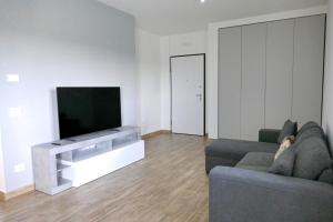 TV a/nebo společenská místnost v ubytování Relux Capurso