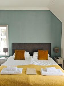 Postel nebo postele na pokoji v ubytování Heatherfield House