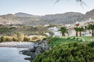 a view of a resort and a river at Lindos Royal Resort in Líndos