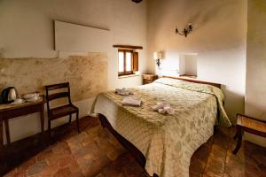 Albergo Diffuso - Rocca Calascioにあるベッド