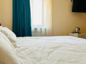Voodi või voodid majutusasutuse SD Hotel toas