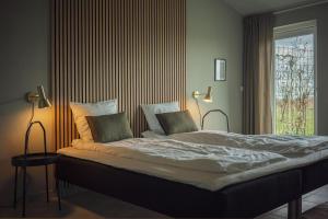 Postel nebo postele na pokoji v ubytování Ellevilde Boutique Hotel