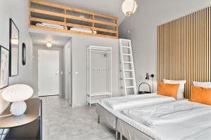 Postel nebo postele na pokoji v ubytování Ellevilde Boutique Hotel