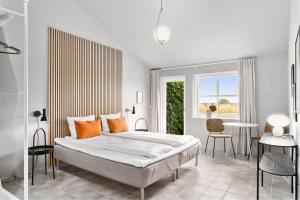 Postel nebo postele na pokoji v ubytování Ellevilde Boutique Hotel