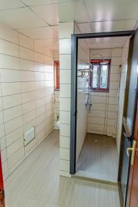 Ένα μπάνιο στο G&G Residency BONAPRISO