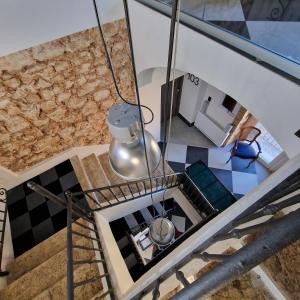 an overhead view of a living room with a chandelier at AF1892rooms in Filignano