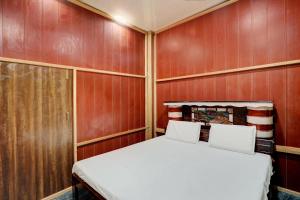Katil atau katil-katil dalam bilik di Hotel O The Honirav Hotel +20 gambar