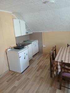 Kuchyň nebo kuchyňský kout v ubytování Kovačević apartman